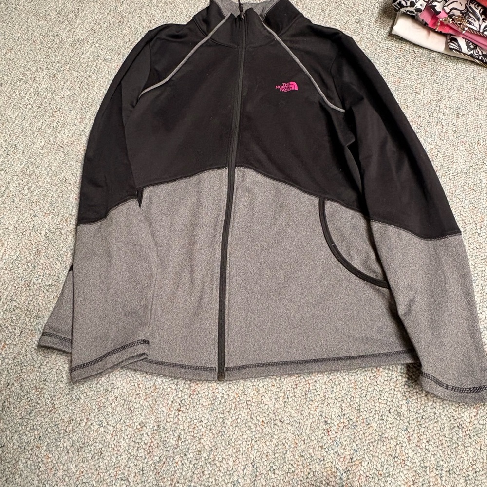 The North Face Black and Gray Zip-Up Jacket with Pink Logo